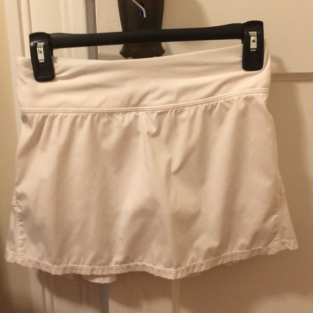 white ivivva tennis skirt